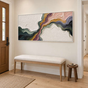 Flowing green, blush, ochre and charcoal bands through white texture in a white frame, displayed above an entryway console.