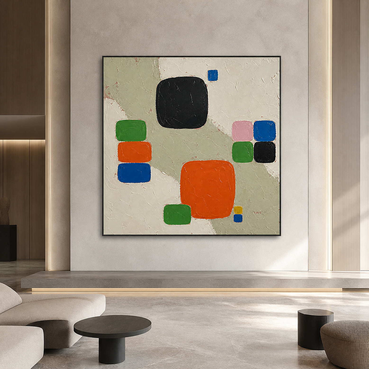 Color Squares Gather on Stone in a black-framed lobby