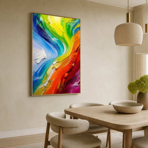 Vibrant vertical abstract wall art displayed beside a light wood dining table.