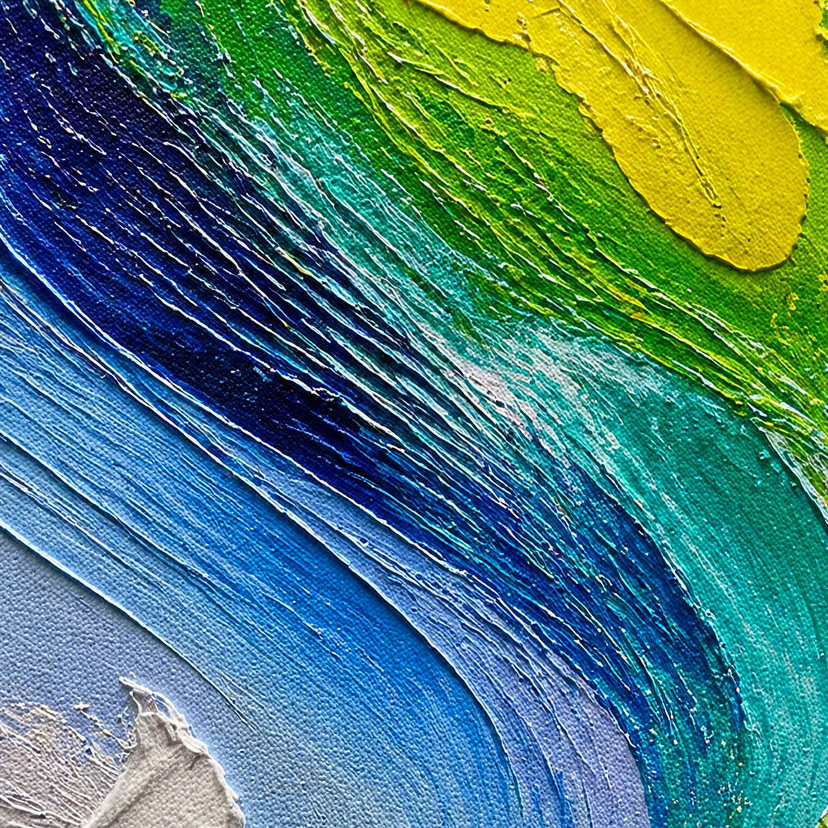 Close-up of deeply ridged blue, turquoise, green, and yellow impasto.