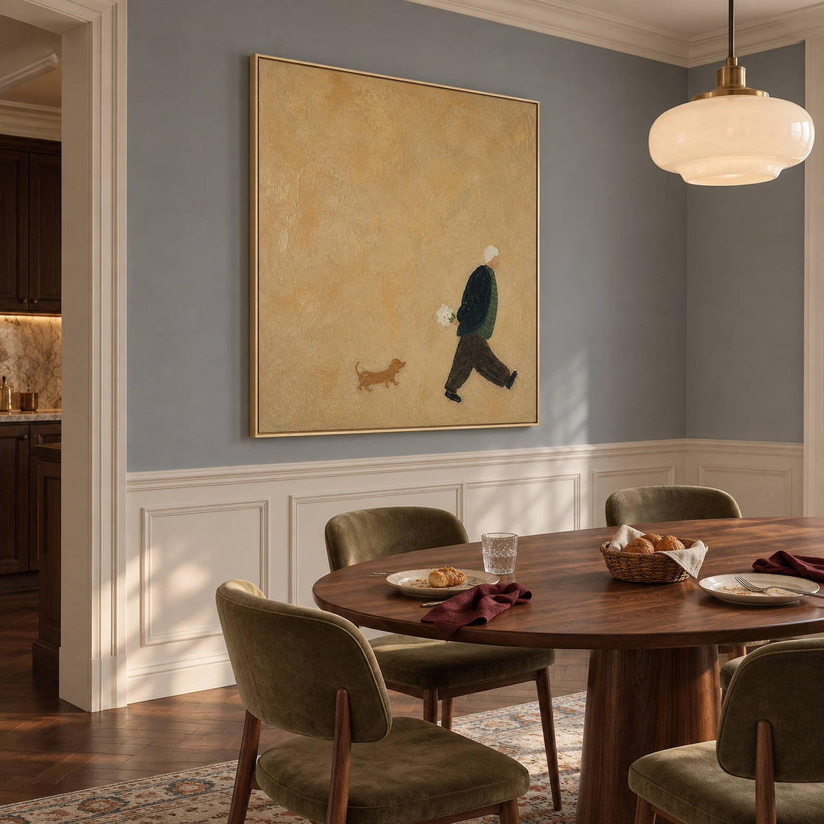 Ochre painting of a flower-carrying walker and a small brown dog in a gold frame in a dining room.