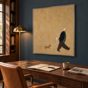 Ochre painting of a flower-carrying walker and a small brown dog in a silver frame in a home office.