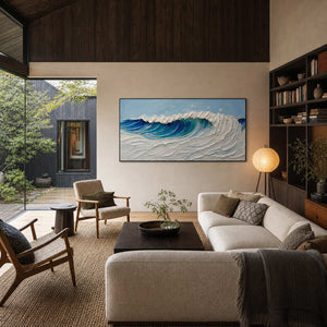 Textured ocean wall art displayed in an airy modern family room.