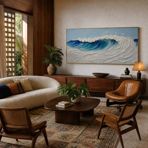 Textured ocean wall art displayed in a warm modern sitting room.