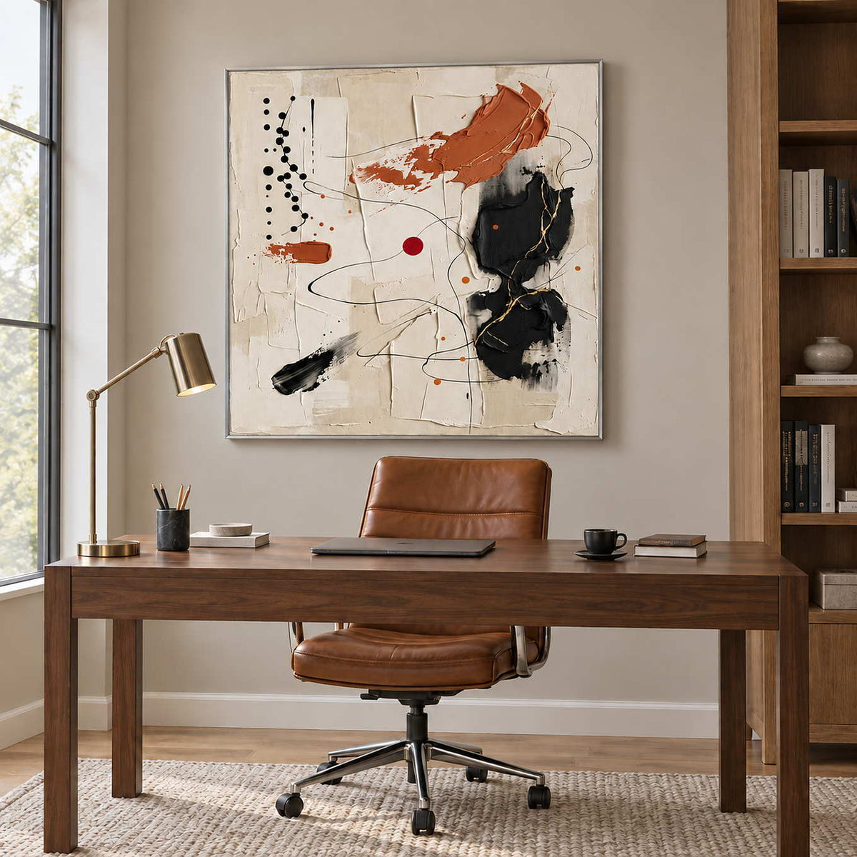 Dancing on a Whim in a silver frame above a wood desk and brown leather office chair.