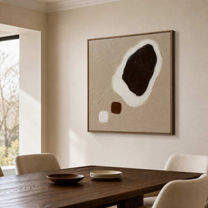 Dark Stone Held in White in a wood-framed dining room