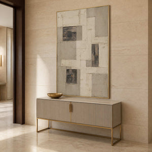 Vertical textured wall art in a refined bathroom with a gold frame.