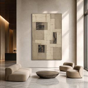 Large architectural abstract wall art in a modern hotel lobby with a silver frame.