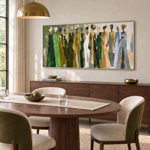Days in Full Bloom in a silver frame above a wood sideboard beside an oval dining table and cream chairs.
