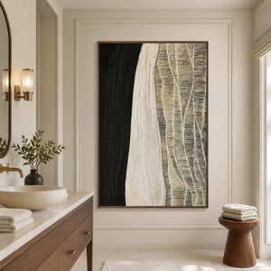 Wood framed woven abstract artwork beside a stone basin in a bathroom dry area.