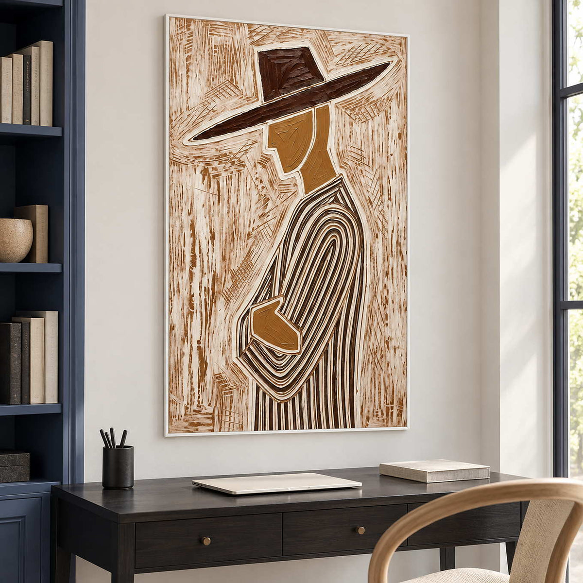 Folded-arm profile painting above a dark desk beside navy bookshelves.
