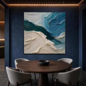 Layered blue coastal painting displayed in a navy dining room.