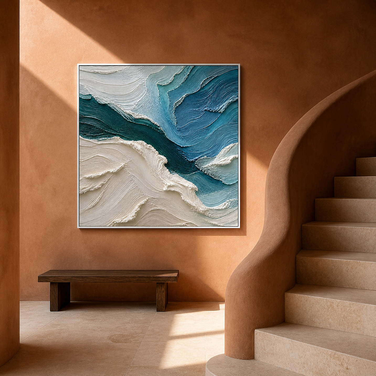 Sculptural blue and white wall art on a terracotta stair landing.