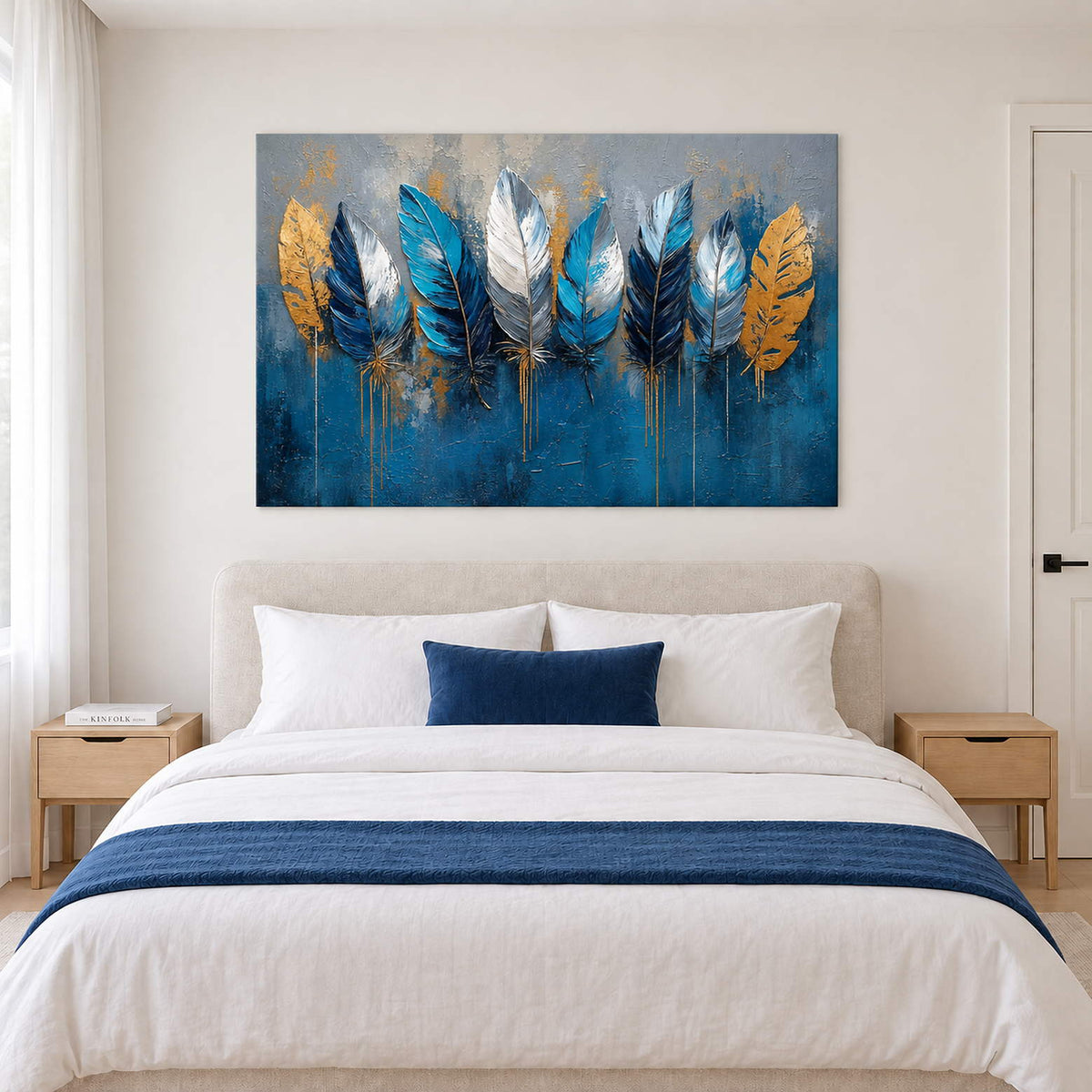 Blue, white and gold feathers against a deep blue and gray background without an outer frame, displayed above a bed.