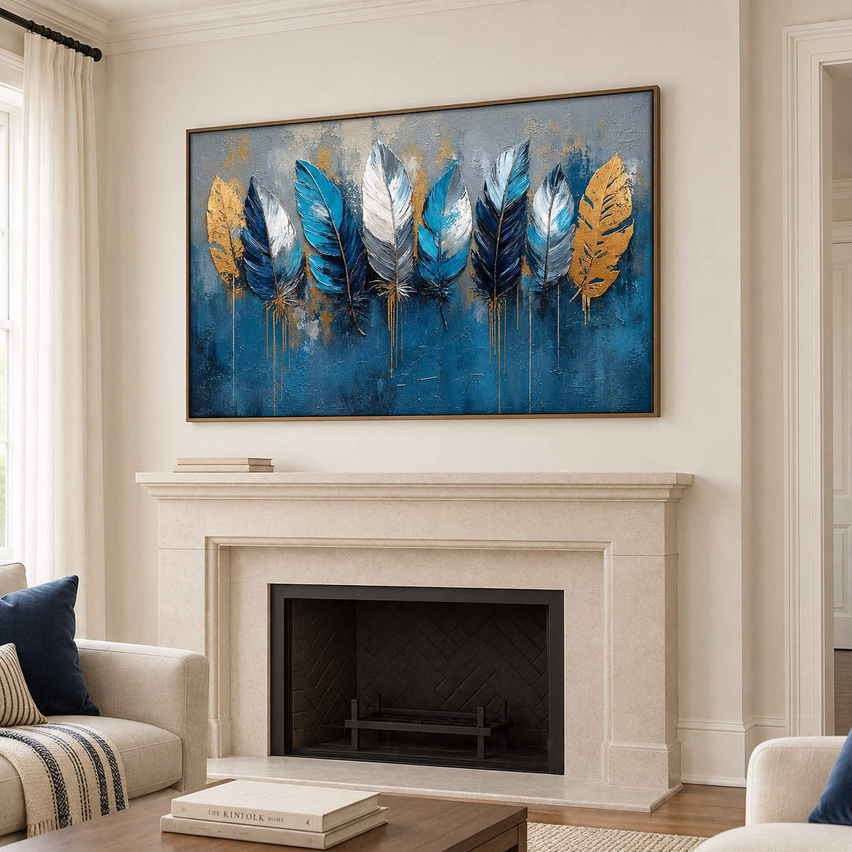 Blue, white and gold feathers against a deep blue and gray background in a brown wood frame, displayed above a fireplace.
