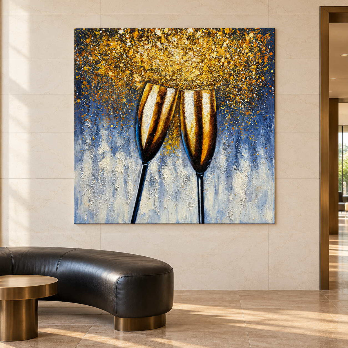 Two golden champagne flutes leaning together beneath gold-colored speckles on blue gray in an artwork with no outer frame, displayed above curved seating in a reception area.