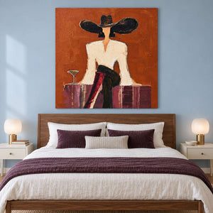 Orange portrait over a bed with plum-colored bedding.