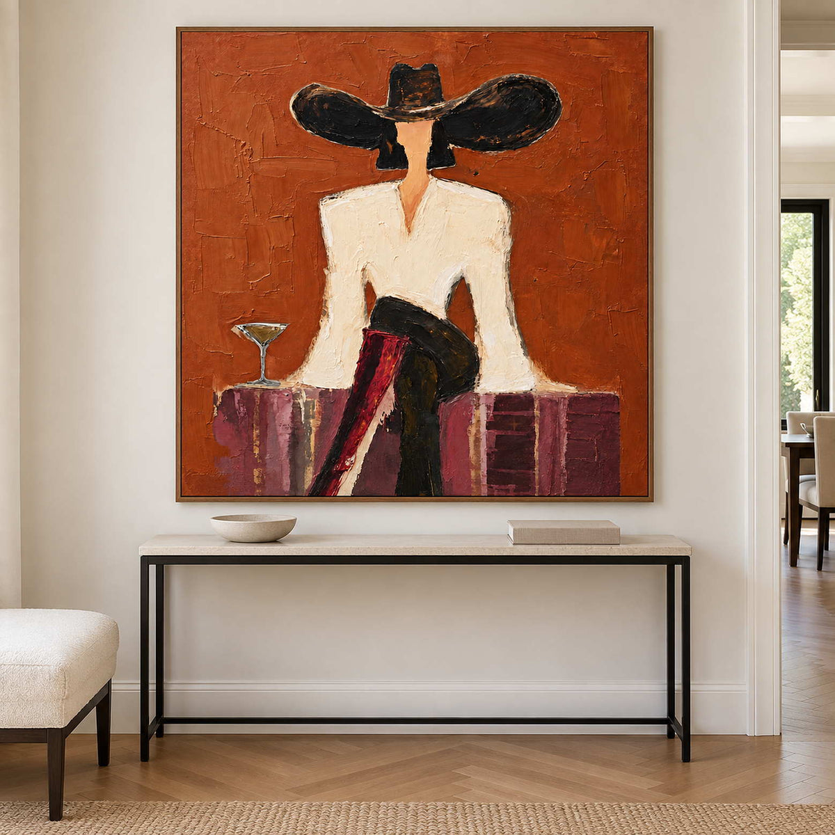 Cream-jacket portrait displayed over a slim black console.