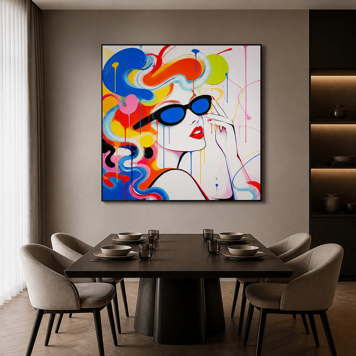 Colorful pop art portrait wall art in a dining room with a black frame.