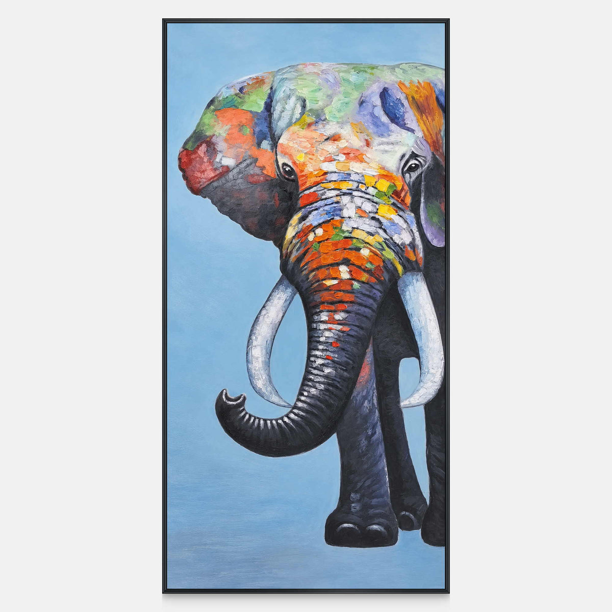 Front view of a front-facing elephant with an upcurled trunk, pale tusks and colored blocks on blue, with a black frame.