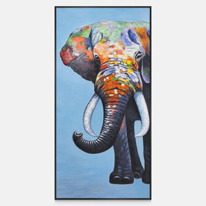 Front view of a front-facing elephant with an upcurled trunk, pale tusks and colored blocks on blue, with a black frame.