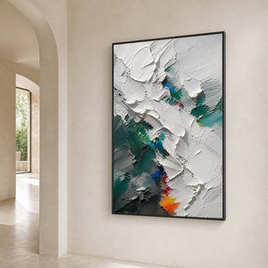 Sculptural emerald abstract canvas anchors a light architectural hallway.