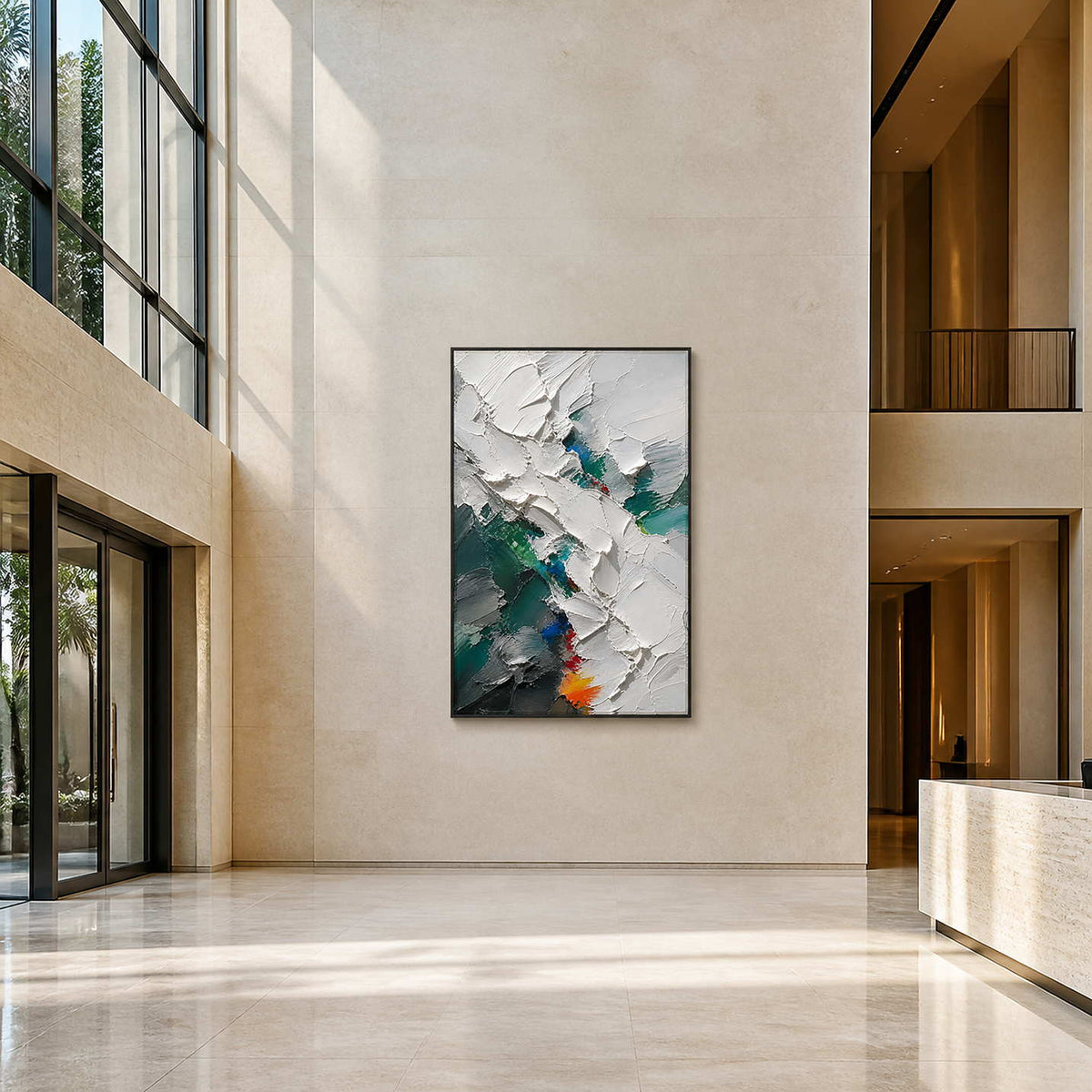 Vertical sculptural abstract wall art displayed in a bright hotel lobby.
