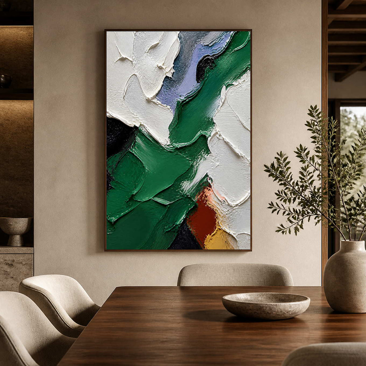 Green and white textured abstract wall art above a warm wood dining table.