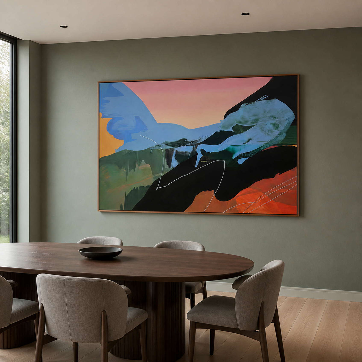 Expressive blue and orange abstract painting in a wood frame beside a dining table.