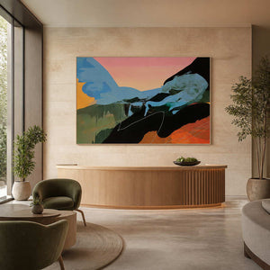 Gestural abstract painting in a silver frame behind a wellness reception desk.
