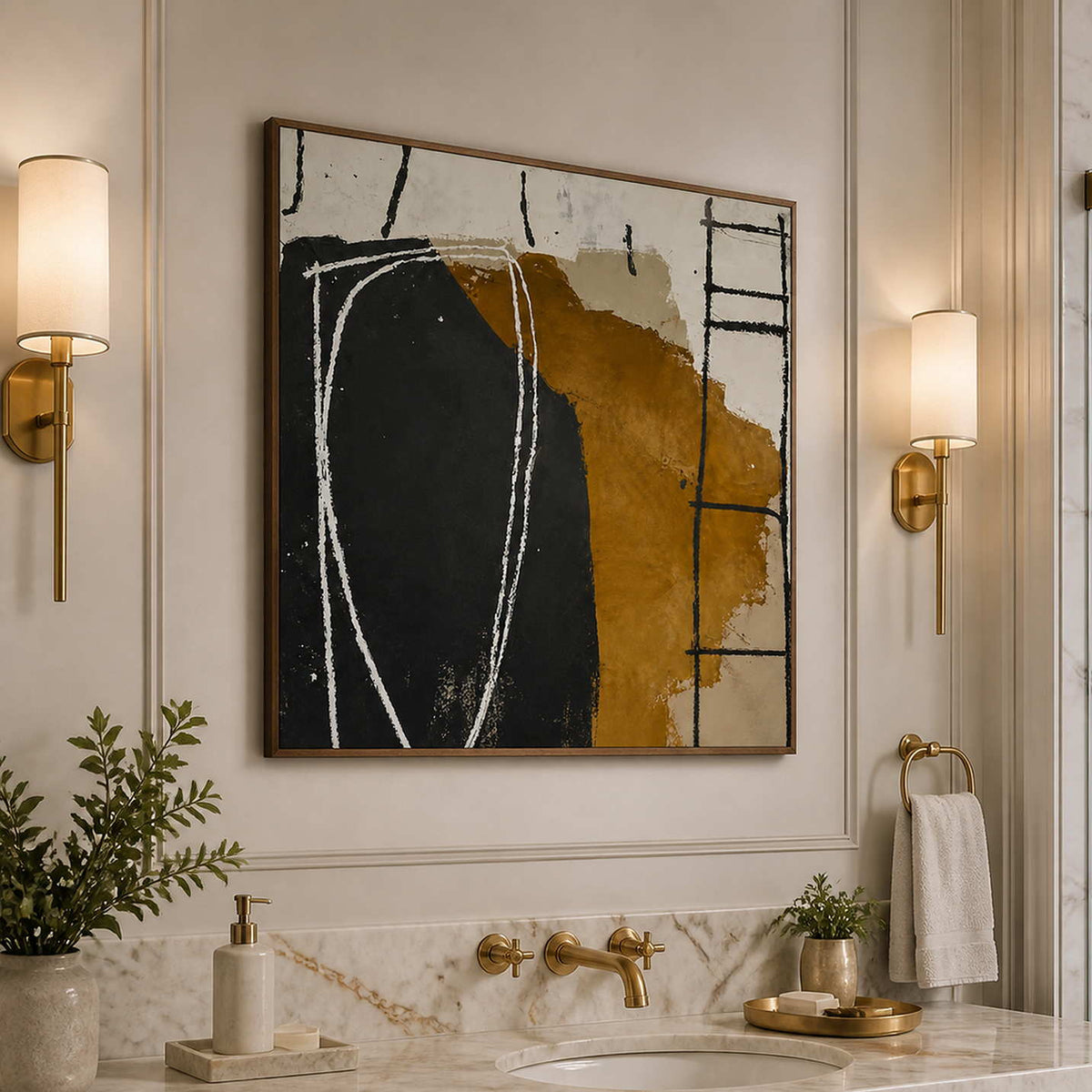 Wood framed abstract painting above a marble bathroom vanity with brass fixtures.