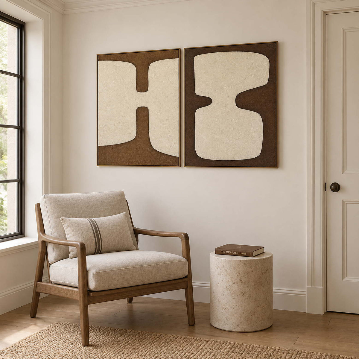Two panels of complementary ivory organic forms on brown grounds in brown wood frames, displayed beside seating in a lounge.
