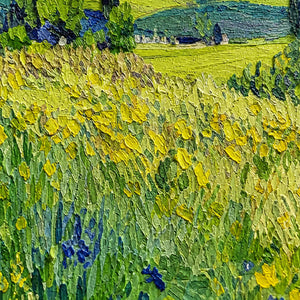 Close view of raised yellow flower strokes and green meadow textures with blue accents.