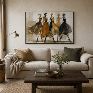 Ochre and black fashion figure wall art displayed in a warm modern living room.
