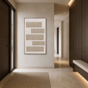 Vertical minimalist artwork displayed in a limestone and walnut entryway.