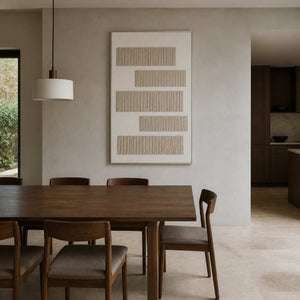 Minimalist textured artwork displayed in a deep walnut dining room.