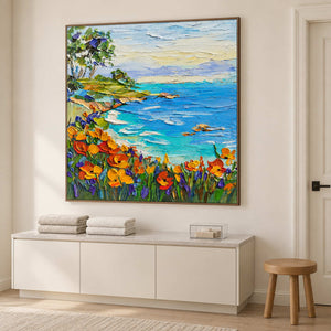 Angled bay-and-flower painting above a white cabinet with towels.