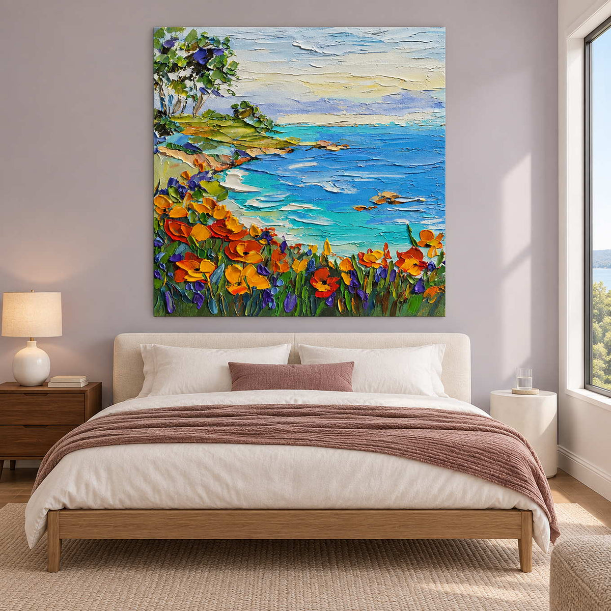 Turquoise bay painting above a bed against a pale lilac wall.