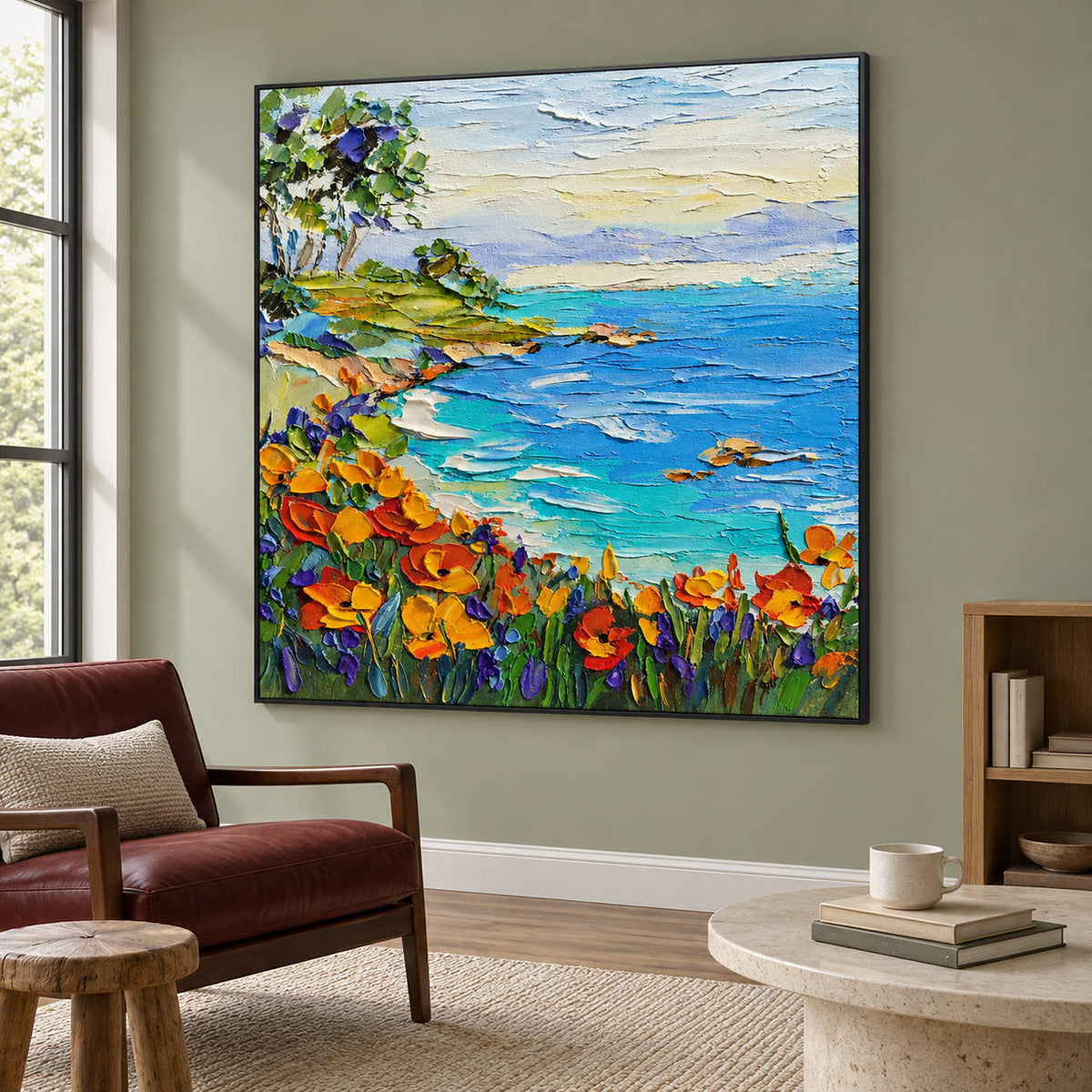 Coastal flowers artwork beside a burgundy reading chair.
