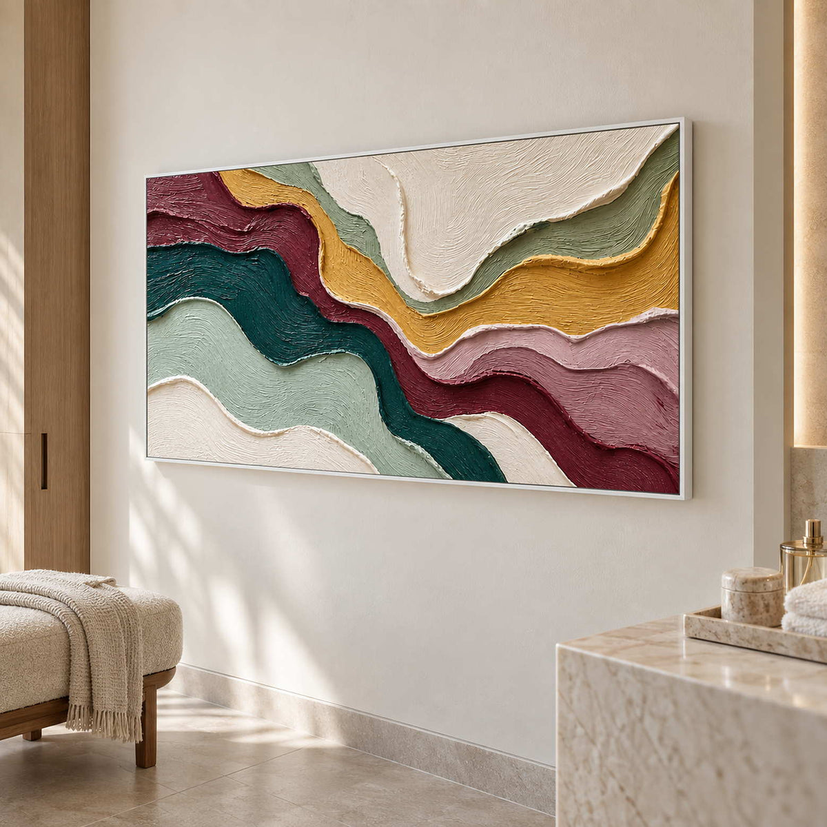 Wavy band painting beside a pale vanity and a cream bench with a draped towel.