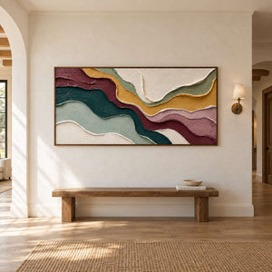 Horizontal color-layer artwork over a simple wooden hallway bench.