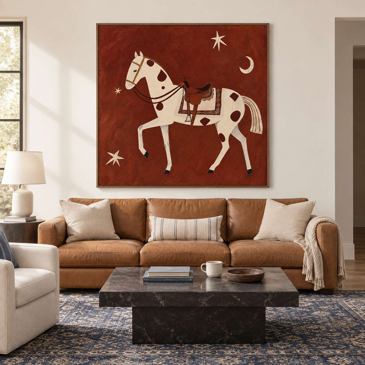 Rust-red horse artwork above a tan sofa and dark square coffee table.