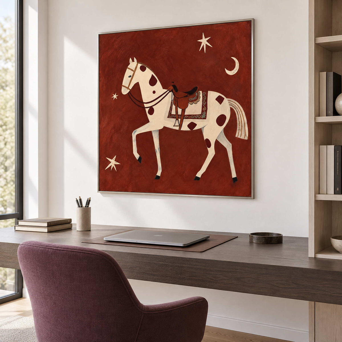 Spotted horse artwork above a desk with a muted purple chair.
