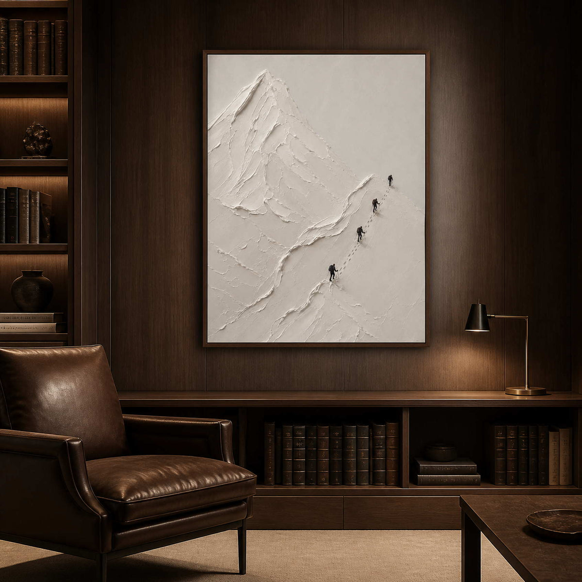 Sculptural mountain wall art displayed in a dark collector reading room.