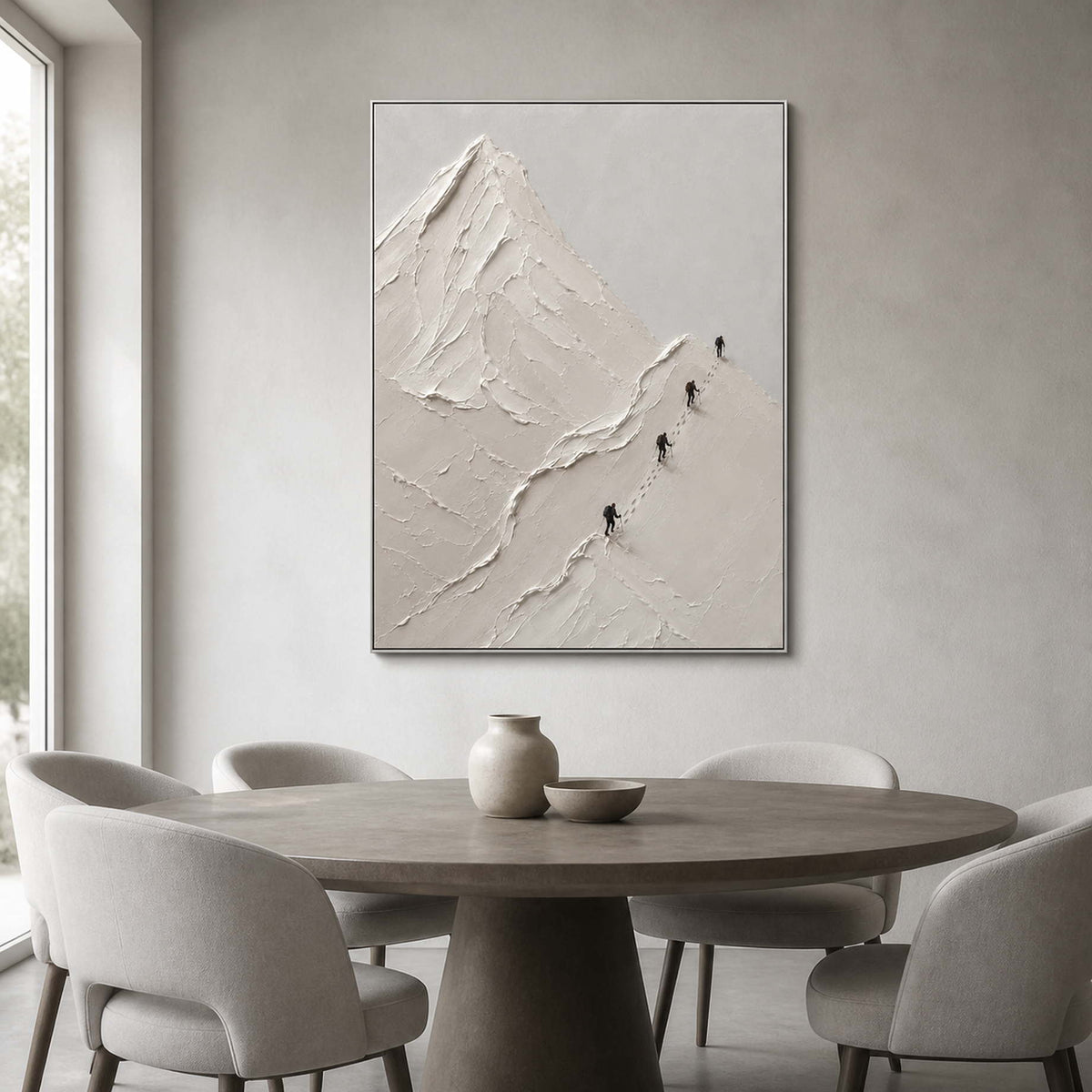 Neutral mountain artwork displayed in a light gray modern dining room.