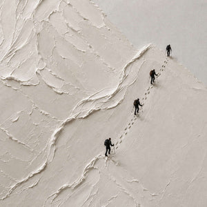 Close-up of tiny climbers and thick sculpted snow-peak texture.
