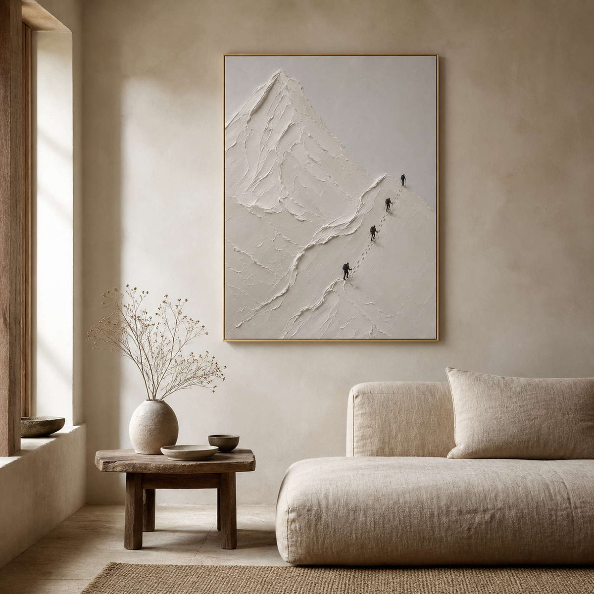Textured white summit artwork displayed in a warm Wabi-Sabi lounge.
