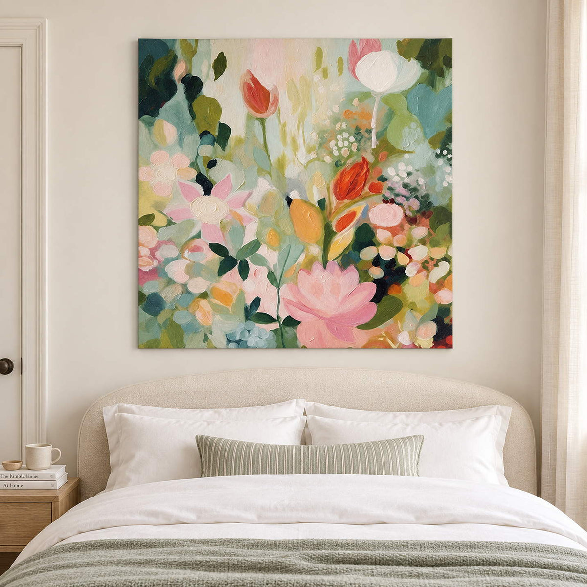 Pink, white and orange flowers among loose green leaves without an outer frame, displayed above a bed.