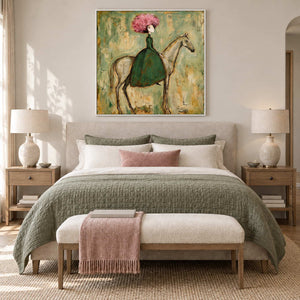 Gentle Company in a white frame above a cream bed with a sage coverlet and a pink throw on the bench.