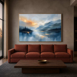 Blue mountain lake wall art above a brick-red sofa in a warm living room.